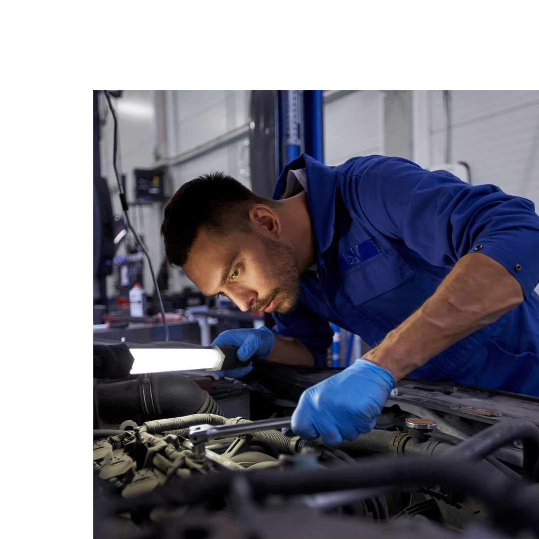 A mechanic performing a system check